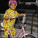 Photo: Franceline rides her new bike